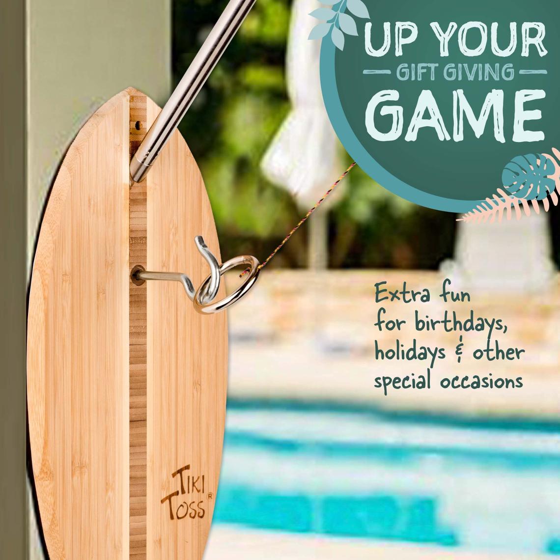 Picture of a Tiki Toss game board that says "Up your Gift Giving Game" in the top right corner and "Extra fun for birthdays, holidays & special occasions" in the middle right